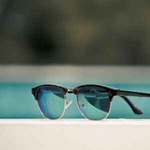 Eclipse sunglasses by the pool