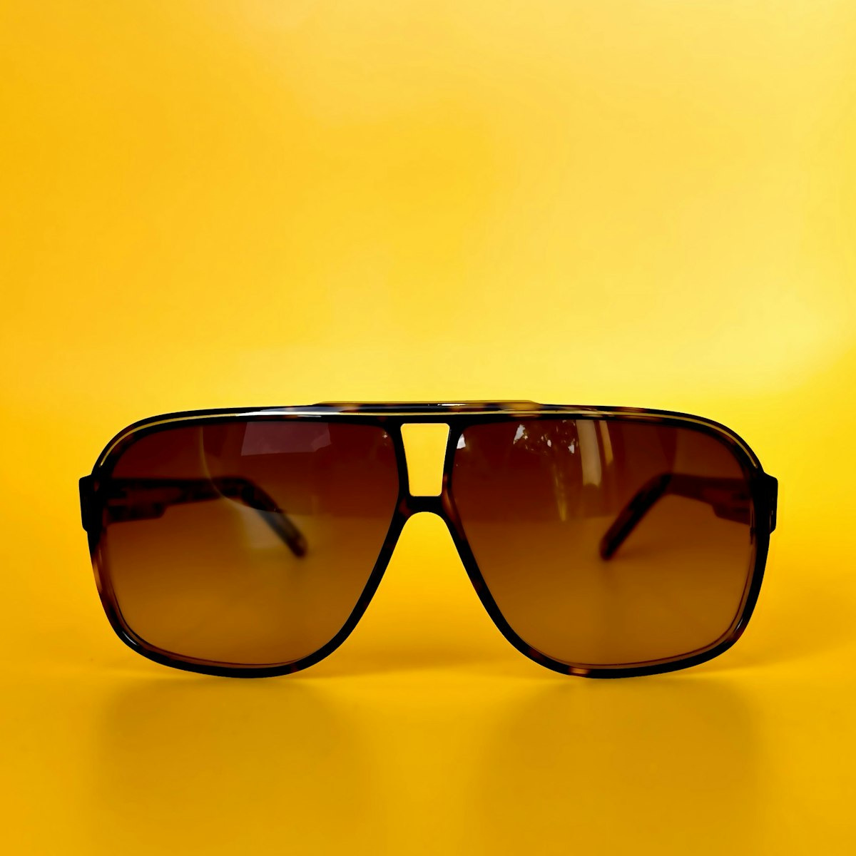 Halden aviator sunglasses on yellow