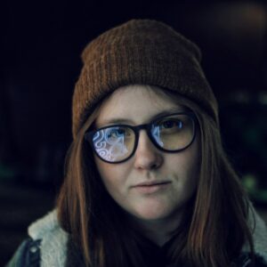 Woman wearing Pixel blue light glasses